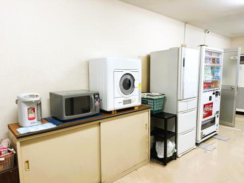 乾燥機・電子レンジ・冷蔵庫・自販機完備(^-^)